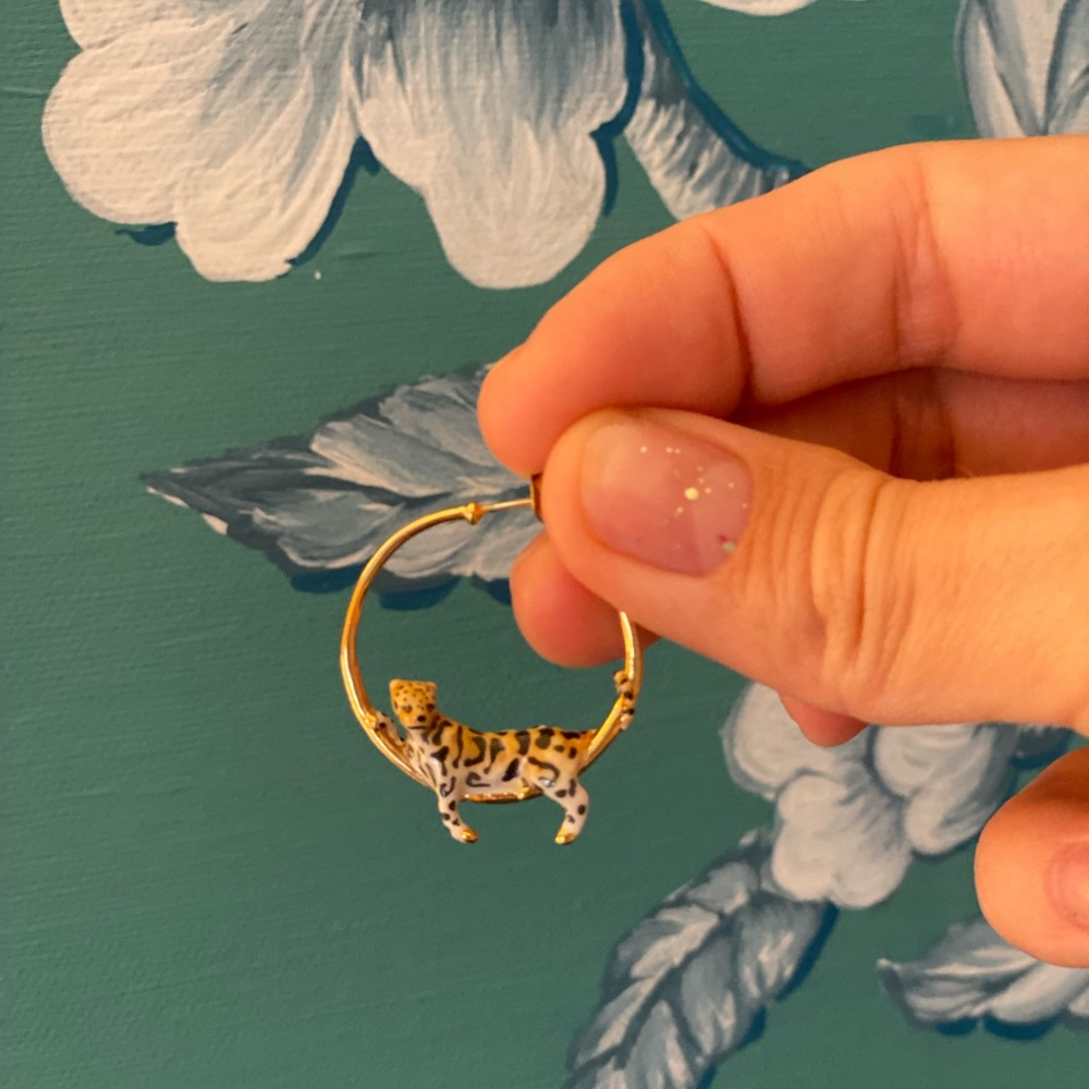 Amazing hoop earrings with laying tigers on each one